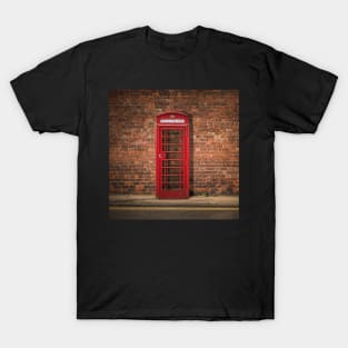 British Phone Box Against Red Brick Wall T-Shirt